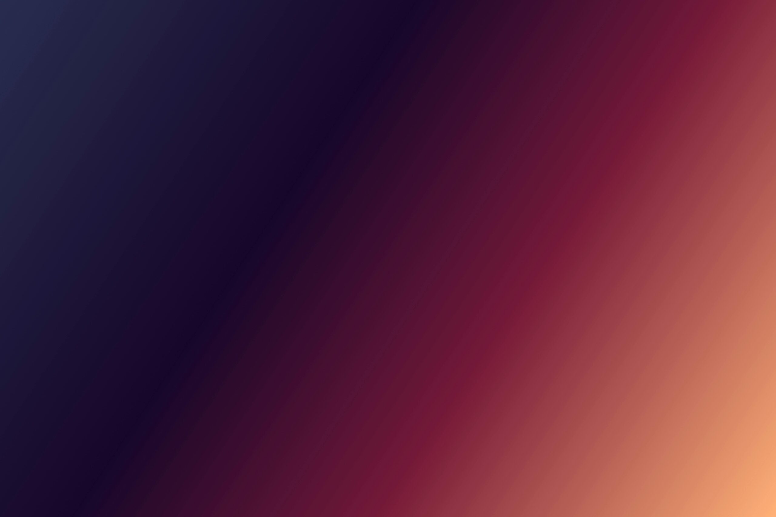 Abstract gradient background featuring warm and cool tones blending seamlessly.